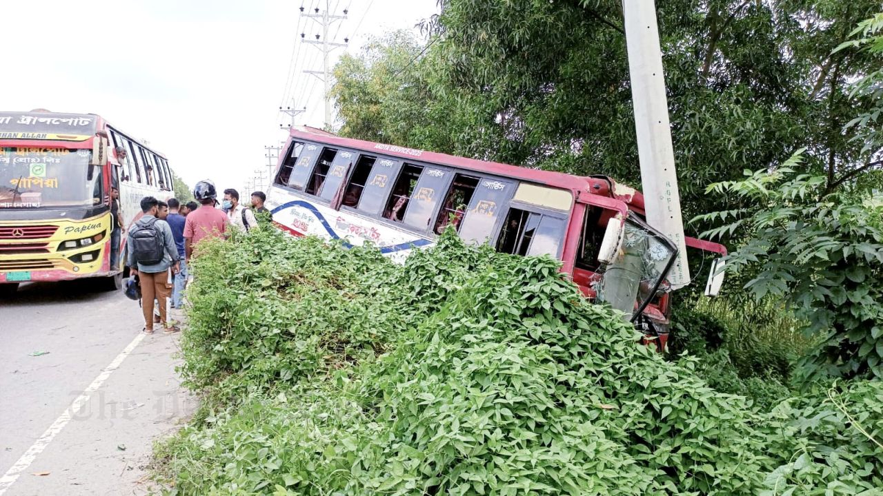 New Ekta bus falls into ditch while overtaking Shyamoli in Chandina, 14 injured